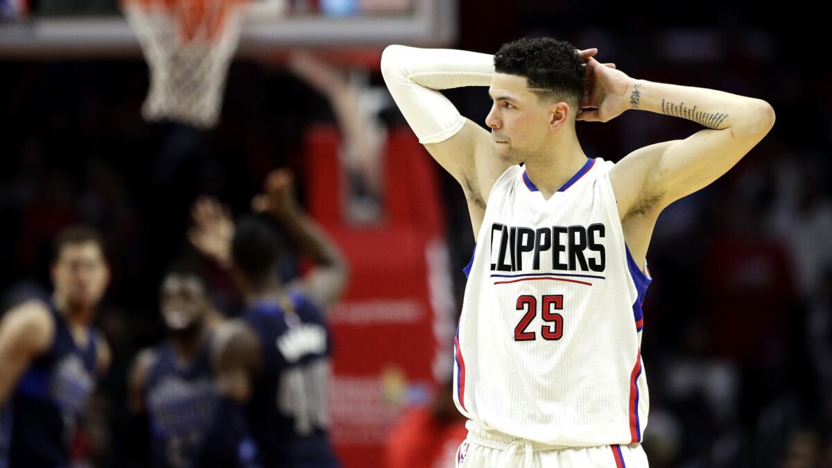 Guard Austin Rivers reacts to a foul called against his team during the game Friday night.