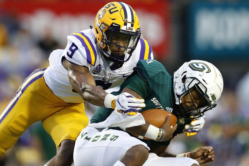 BATON ROUGE, LA - SEPTEMBER 08: Grant Delpit #9 of the LSU Tigers sacks Chason Virgil #9 of the Southeastern Louisiana Lions during the first half at Tiger Stadium on September 8, 2018 in Baton Rouge, Louisiana. (Photo by Jonathan Bachman/Getty Images) ** OUTS - ELSENT, FPG, CM - OUTS * NM, PH, VA if sourced by CT, LA or MoD **