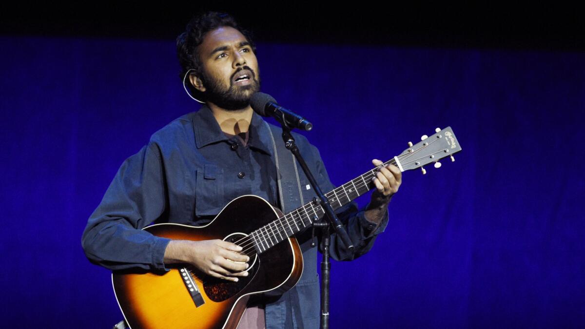 Himesh Patel, star of the upcoming film "Yesterday," performs the Beatles' song of the same name during the Universal Pictures presentation at CinemaCon in Las Vegas.