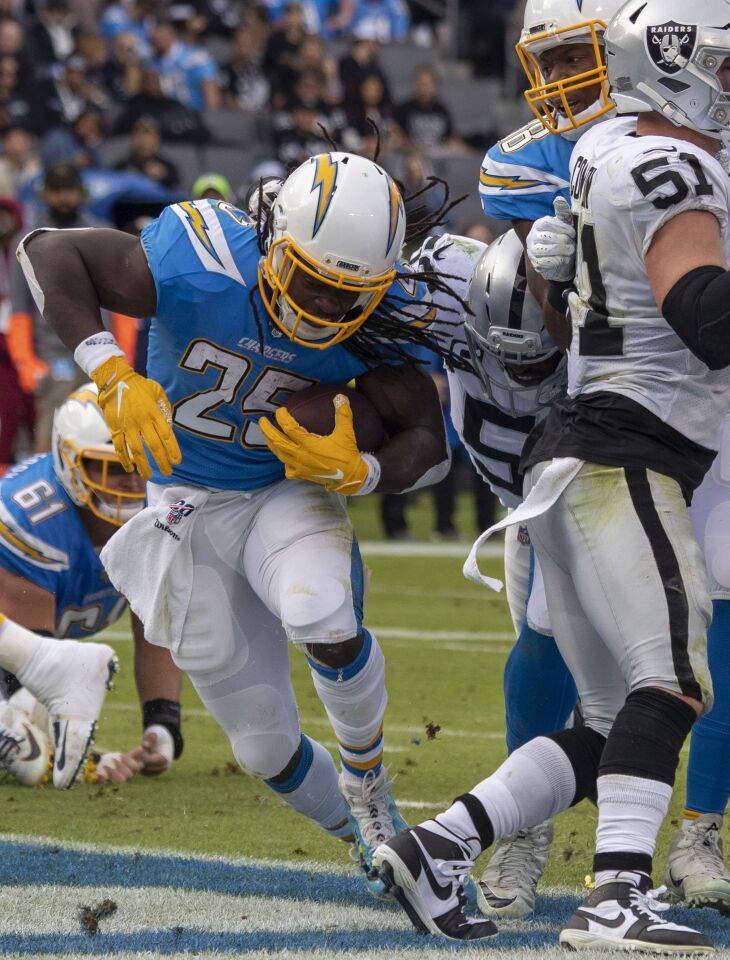 Chargers running back Melvin Gordon scores a touchdown against the Oakland Raiders in the second quarter.
