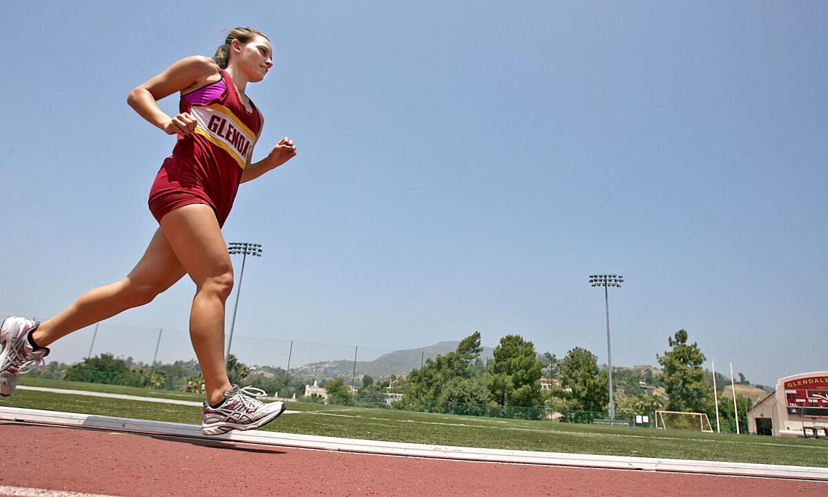 This 2010 file photo shows former Glendale Community College track and field runner Nina Moore, 19 of Santa Clarita, practicing on the college field. College trustees last week agreed to spend $940,477 to replace the track and field, which were last upgraded in 2005.