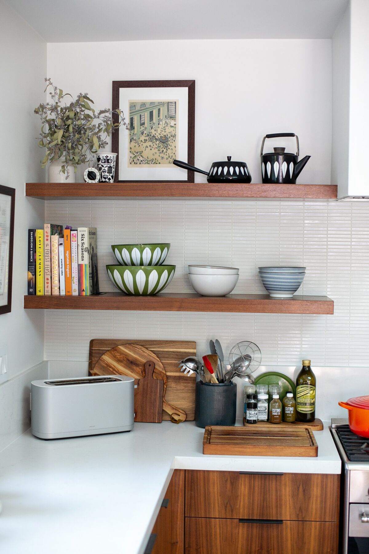 Bowls on kitchen shelves above a counter  