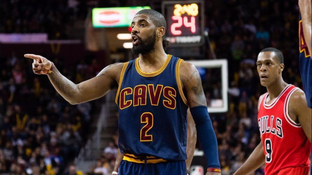 Cavaliers guard Kyrie Irving yells to his teammates during the second half of a game against the Bulls on Feb. 25.