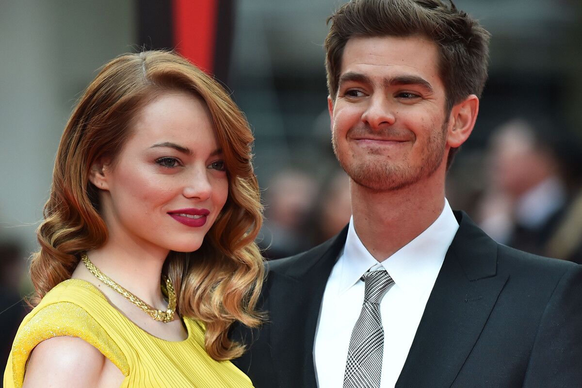 Emma Stone amd Andrew Garfield arrive on the red carpet for the world premiere of "The Amazing Spider-man 2" in London.