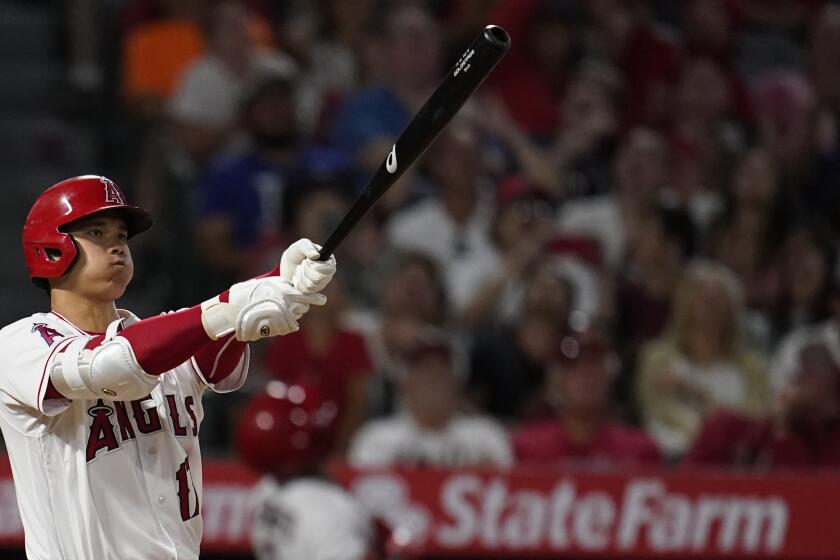 Los Angeles Angels' Shohei Ohtani bats during a baseball game against the Seattle Mariners Tuesday, Aug. 16, 2022, in Anaheim, Calif. (AP Photo/Marcio Jose Sanchez)