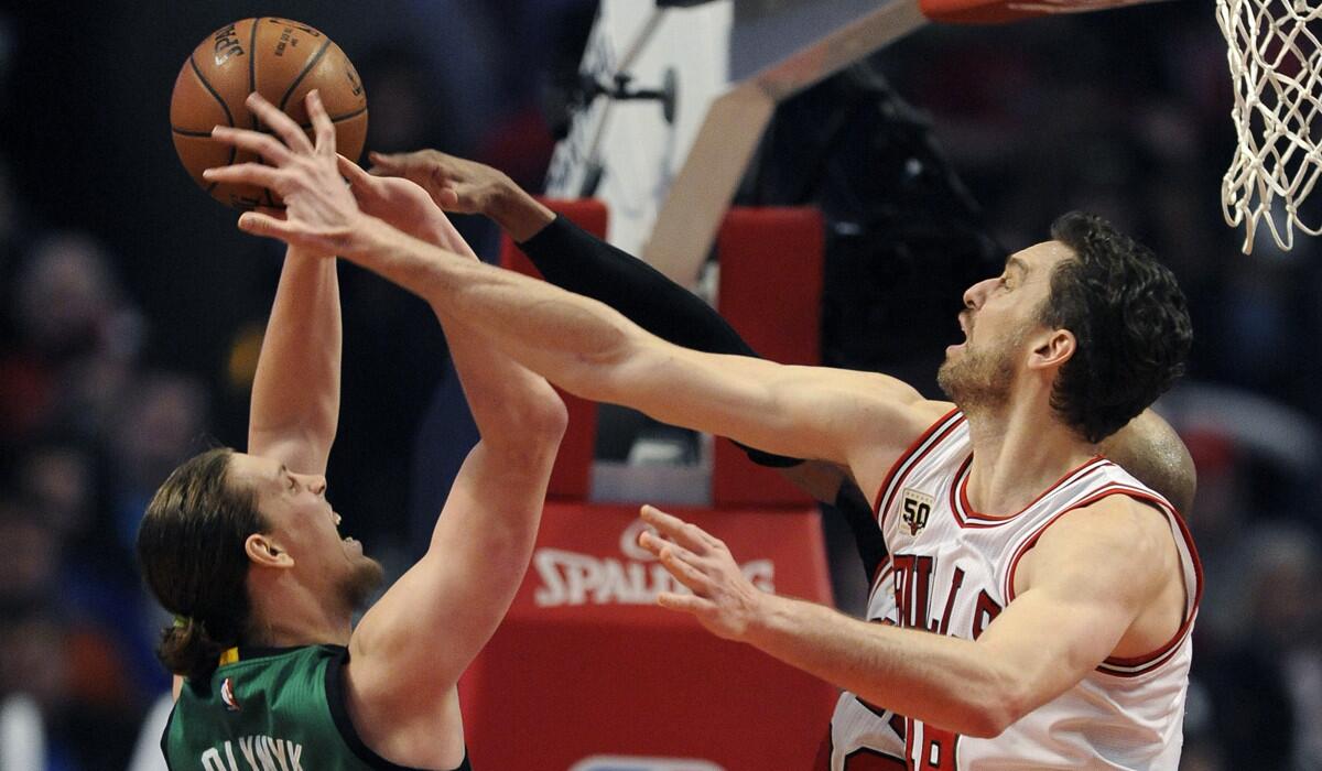 Bulls center Pau Gasol blocks a shot by Celtics center Kelly Olynyk during a game Jan. 7.