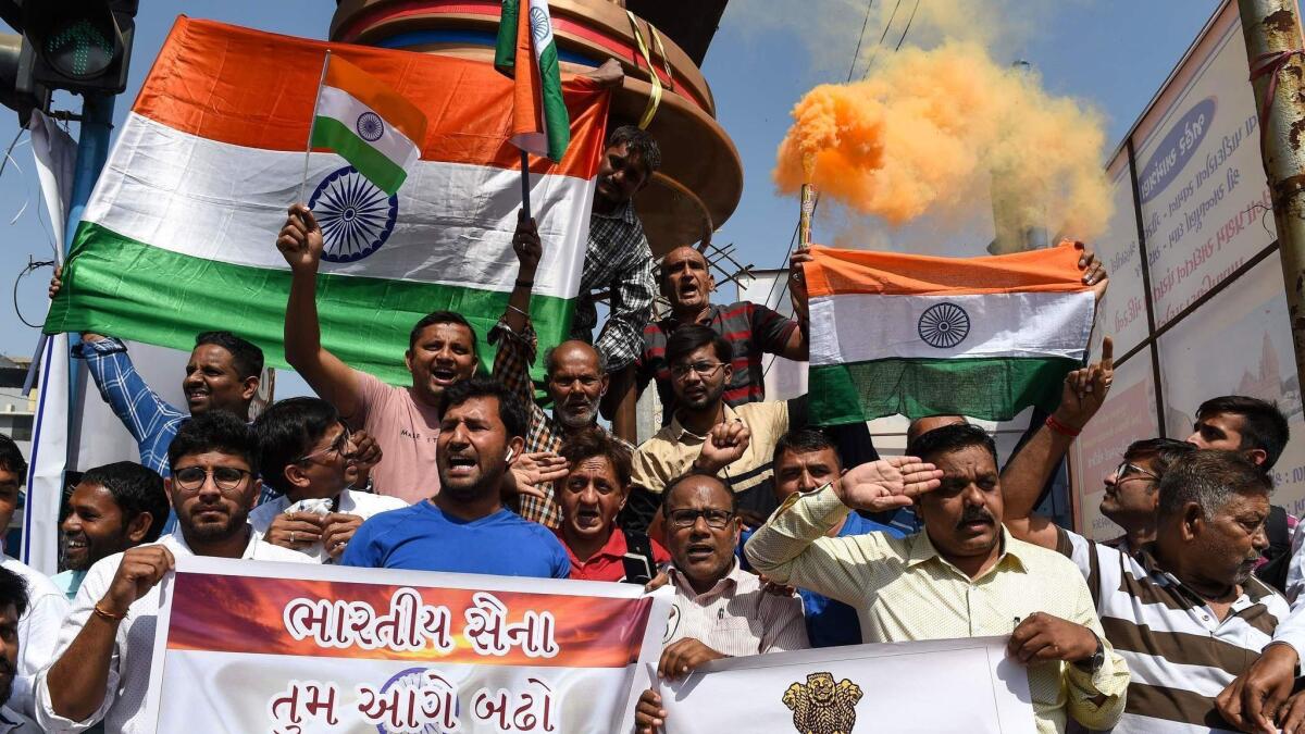 Residents in Ahmedabad, India, demonstrate in support of the military on Feb. 26, 2019, after an airstrike on what India said was a terrorist training camp in Pakistan.