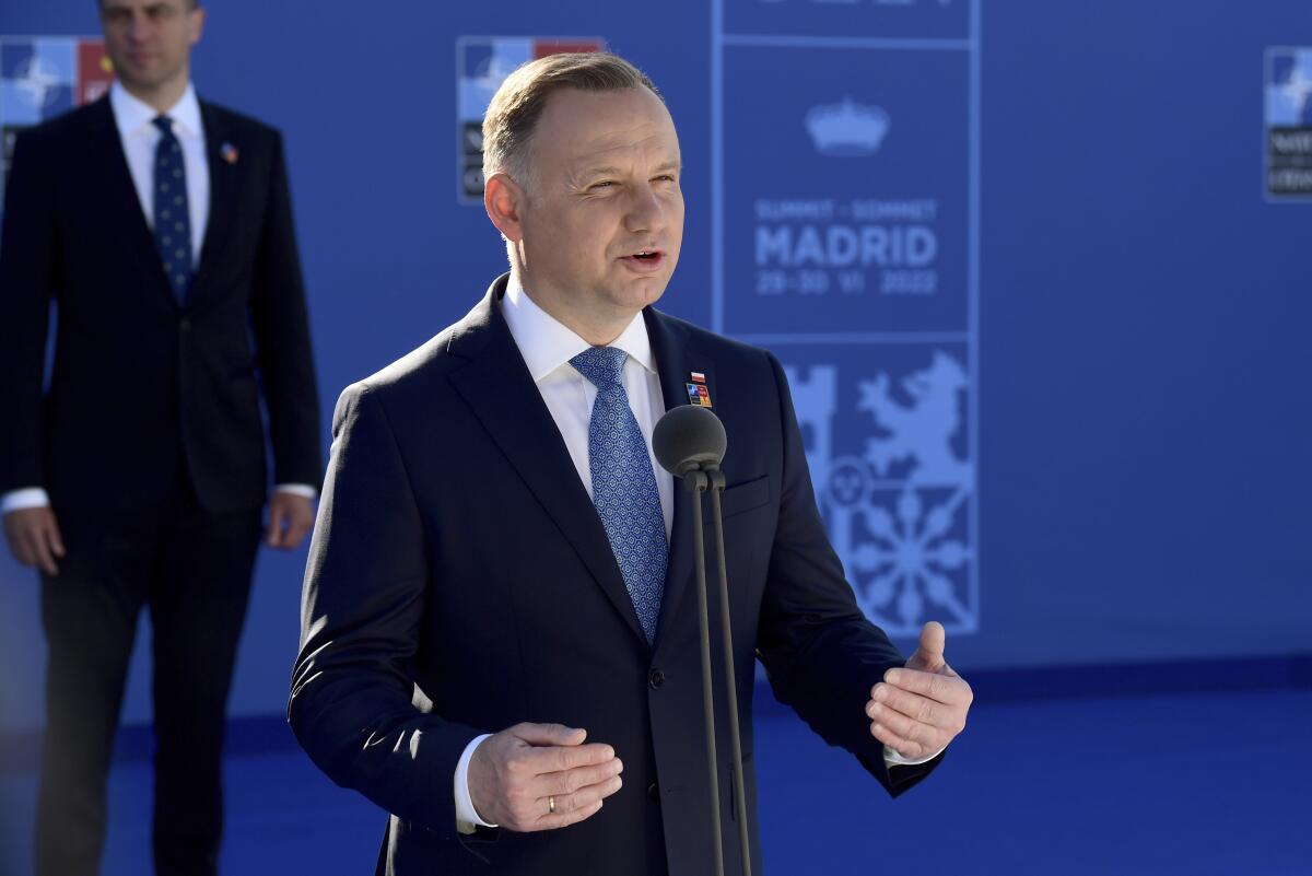 FILE - Poland President Andrzej Duda speaks as he arrives at the NATO Heads of State summit in Madrid, on June 30, 2022. The Polish president says Poland and Israel have taken a step toward normalizing diplomatic ties as the Israeli ambassador officially presented his credentials in Warsaw. President Andrzej Duda tweeted that he and Israeli President Issac Herzog have “agreed that it’s time to return to normal relations.” (Bertrand Guay, Pool via AP)