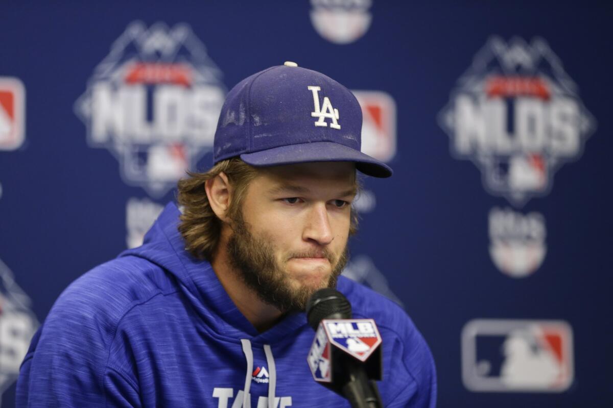 Dodgers pitcher Clayton Kershaw listens to a question during a news conference on Monday.