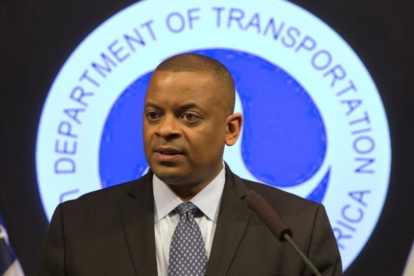 FILE - In this May 19, 2015 file photo, Transportation Secretary Anthony Foxx speaks at the Transportation Department in Washington. Ten automakers have committed to the government to include automatic emergency braking in all new cars, a step safety advocates say could significantly reduce traffic deaths and injuries. (AP Photo/Jacquelyn Martin, File)