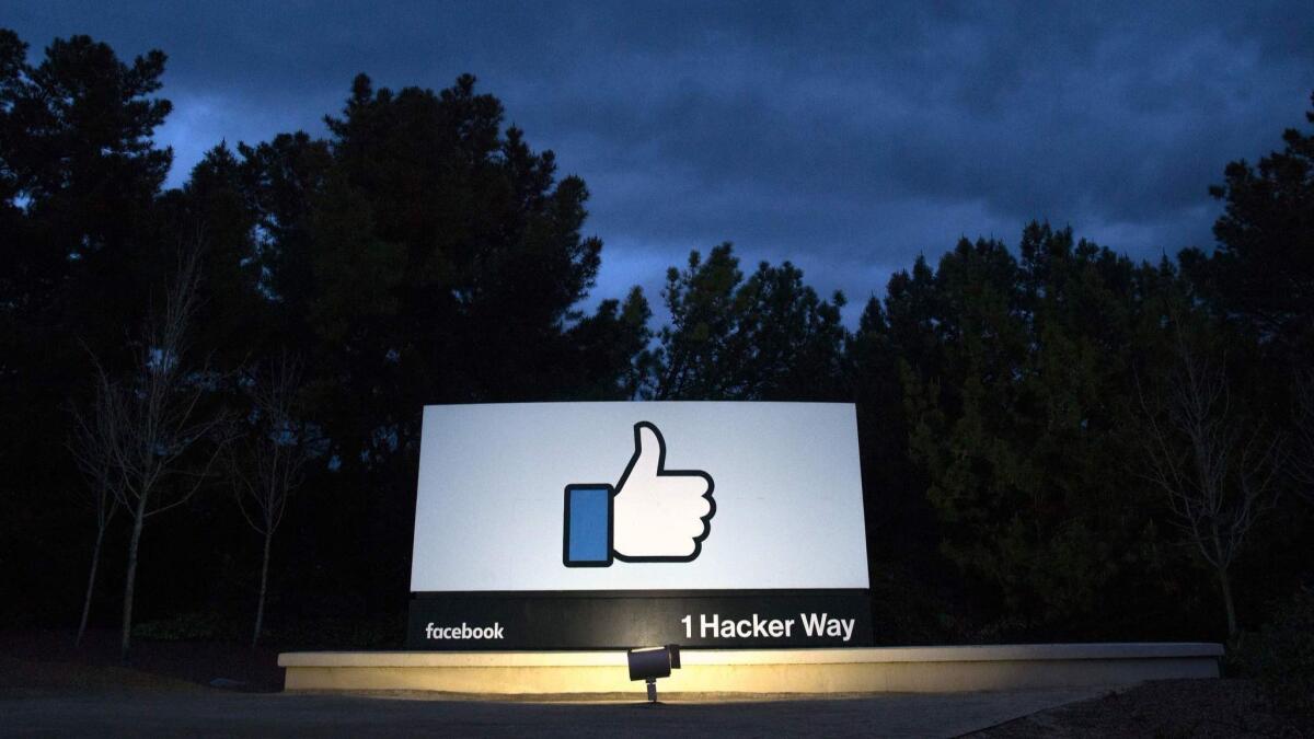 A sign at the entrance to Facebook's corporate headquarters in Menlo Park, Calif.