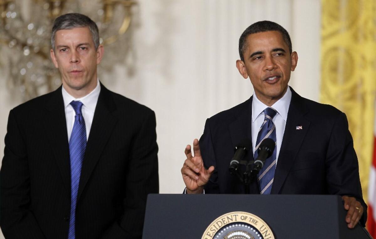 California and the Obama administration disagree on standardized testing during the state's transition to the Common Core curriculum standards. Above, President Obama is seen with U.S. Education Secretary Arne Duncan in 2012.