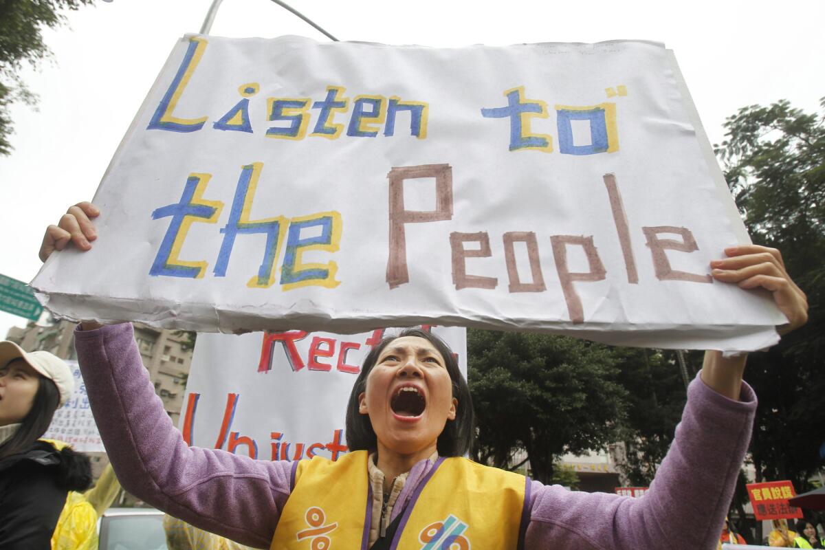 Thousands of Taiwanese demanded tax reform outside the Ministry of Finance in Taipei.