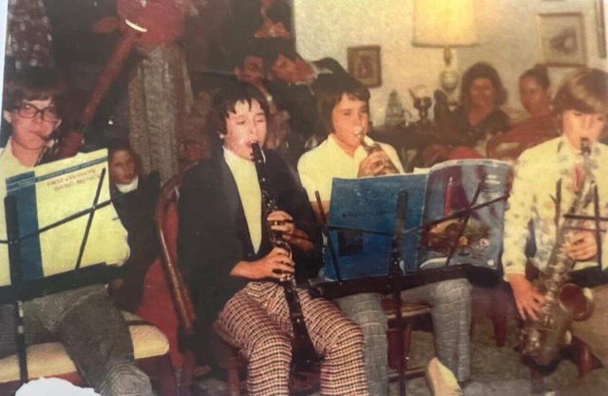 Young guests perform at the O'Meara Christmas party, circa 1977. 