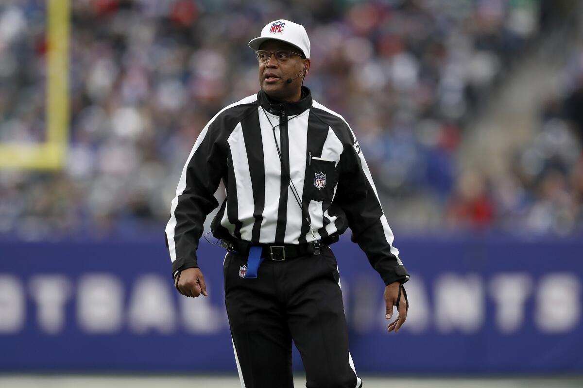 Referee Shawn Smith (14) during an NFL football game between the