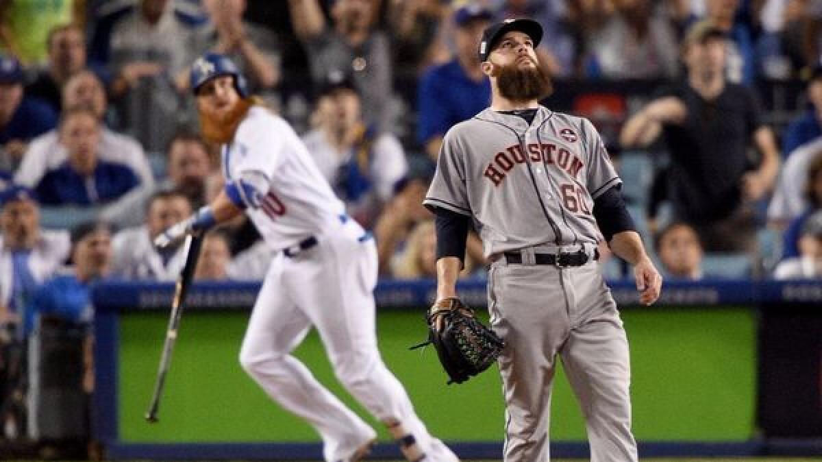 Houston's Dallas Keuchel reacts after allowing a go-ahead, two-run home run to Justin Turner during the sixth inning of Game 1 of the World Series.