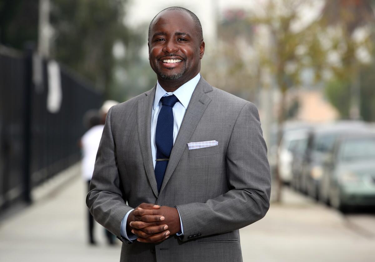 8th Council District candidate Marqueece Harris-Dawson is seen before a forum at the Barack Obama Global Preparation Academy.