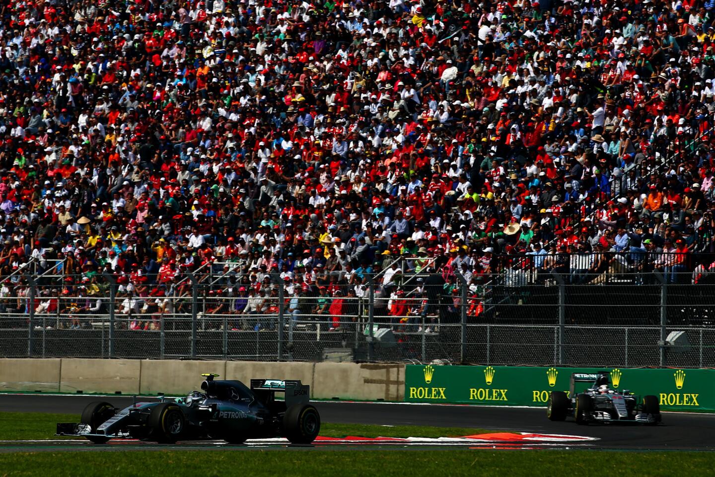 MEXICO CITY, MEXICO - NOVEMBER 01: Nico Rosberg of Germany and Mercedes GP drives ahead of Lewis Hamilton of Great Britain and Mercedes GP during the Formula One Grand Prix of Mexico at Autodromo Hermanos Rodriguez on November 1, 2015 in Mexico City, Mexico. (Photo by Mark Thompson/Getty Images) ** OUTS - ELSENT, FPG, CM - OUTS * NM, PH, VA if sourced by CT, LA or MoD **