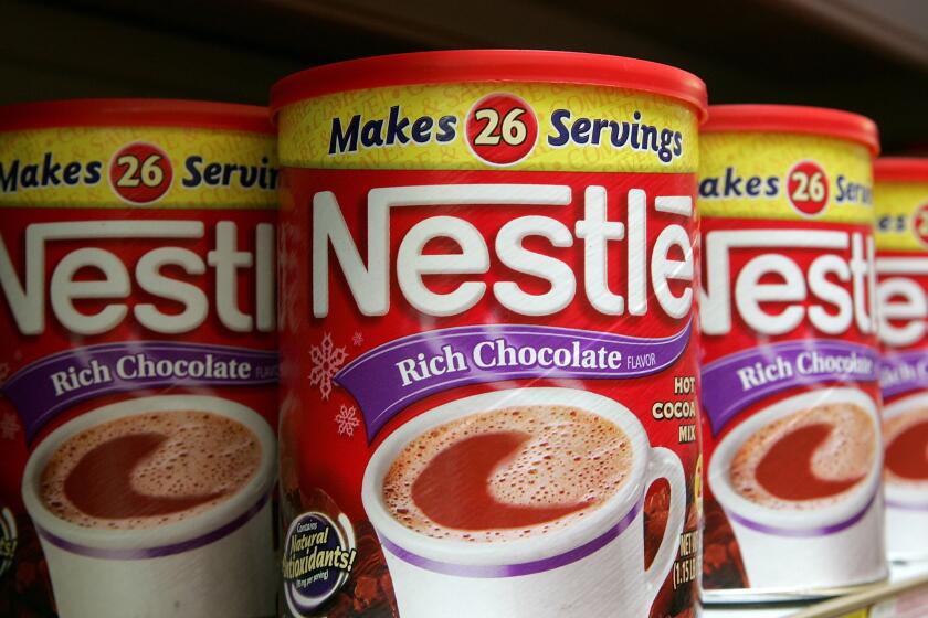 SAN FRANCISCO - FEBRUARY 23: Containers of Nestle hot chocolate mix are seen on a store shelf February 23, 2006 in San Francisco, California. Profit for Nestle, the world's biggest food and beverage company, rose $6.1 billion or 21 percent in 2005 with sales increasing 7.5 percent for to $69.54 billion. (Photo by Justin Sullivan/Getty Images)
