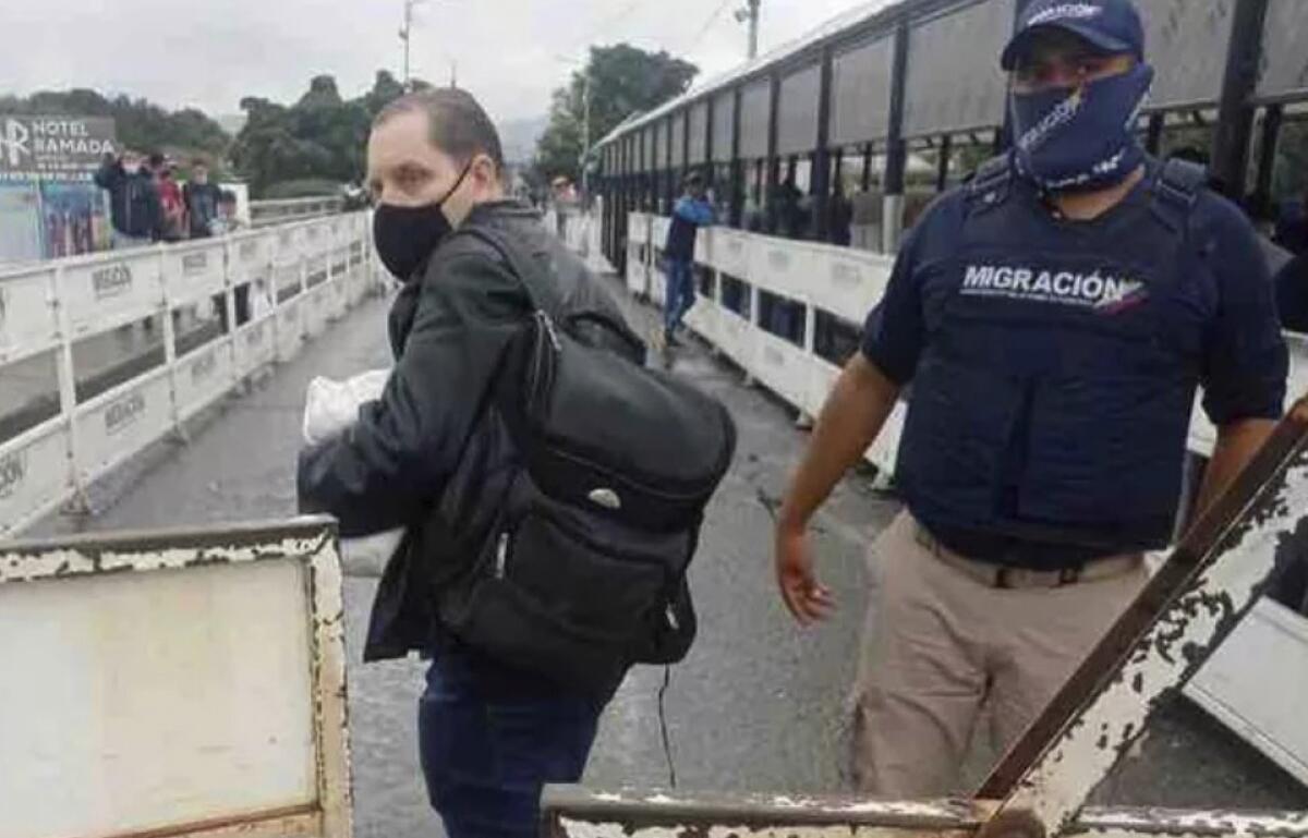 American man with backpack at Colombia-Venezuela border