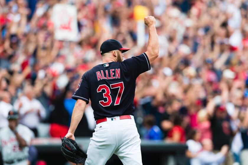 CLEVELAND, OH - SEPTEMBER 13: Closing pitcher Cody Allen #37 of the Cleveland Indians celebrates after the last out to defeat the Detroit Tigers at Progressive Field on September 13, 2017 in Cleveland, Ohio. The Indians defeated the Tigers for their 21st straight win, setting the American League record for consecutive wins a day after tying it. (Photo by Jason Miller/Getty Images) ** OUTS - ELSENT, FPG, CM - OUTS * NM, PH, VA if sourced by CT, LA or MoD **