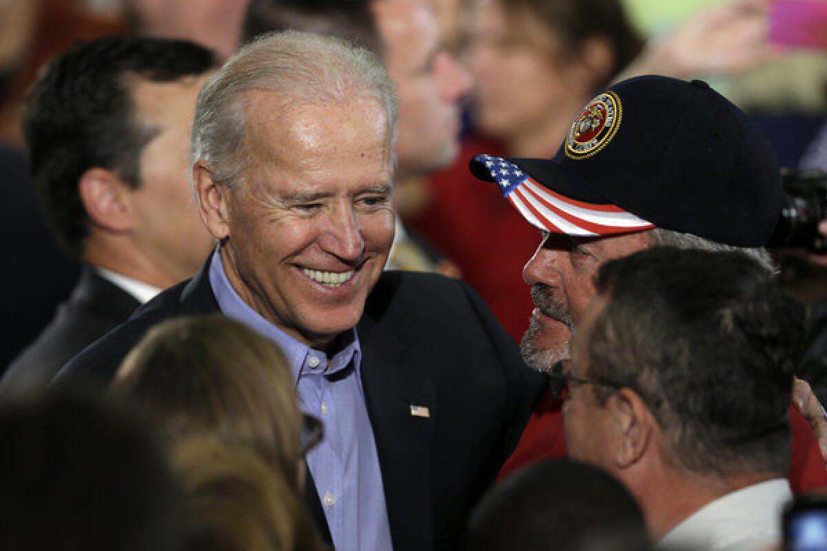 Vice President Joe Biden greets supporters after speaking at a campaign rally at the Municipal Auditorium in Sarasota, Fla.