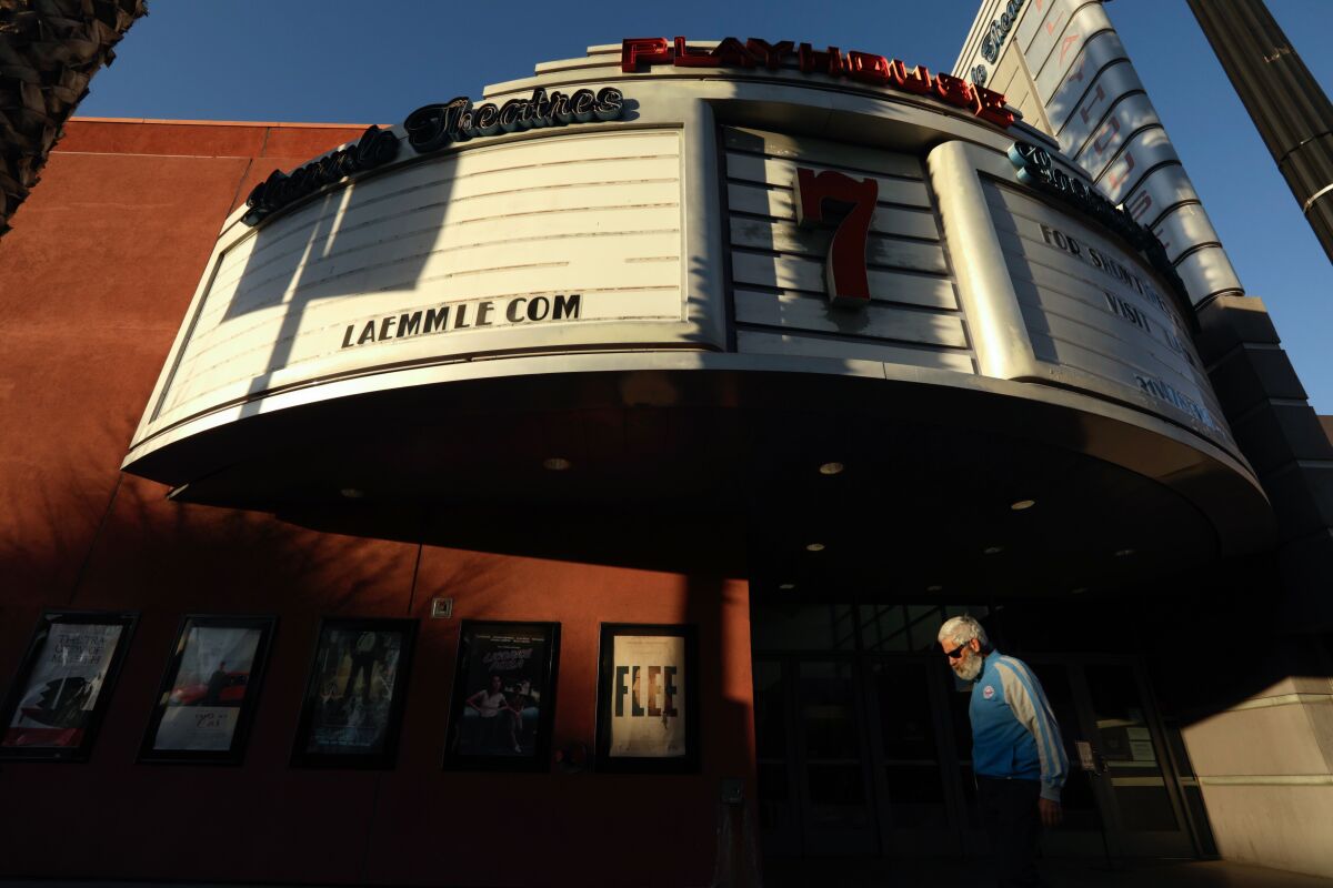 Shadows envelope the Laemmle Theatre's Playhouse 7, featuring a blank marquee, in Pasadena on February 2, 2022.