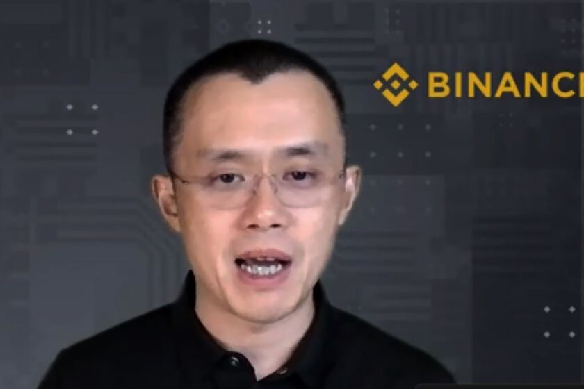 FILE - Binance CEO Changpeng Zhao answers a question during a Zoom meeting interview with The Associated Press on Nov. 16, 2021. Binance and its founder Changpeng Zhao are accused of misusing investor funds, operating as an unregistered exchange and violating a slew of U.S. securities laws in a lawsuit filed by the SEC. Filed in the U.S. District Court for the District of Columbia, the Securities and Exchange Commission lawsuit on Monday, June 5, 2023 lists thirteen charges against the firm — including commingling and divert customer assets to an entity Zhao owned called Sigma Chain. (AP Photo, File)