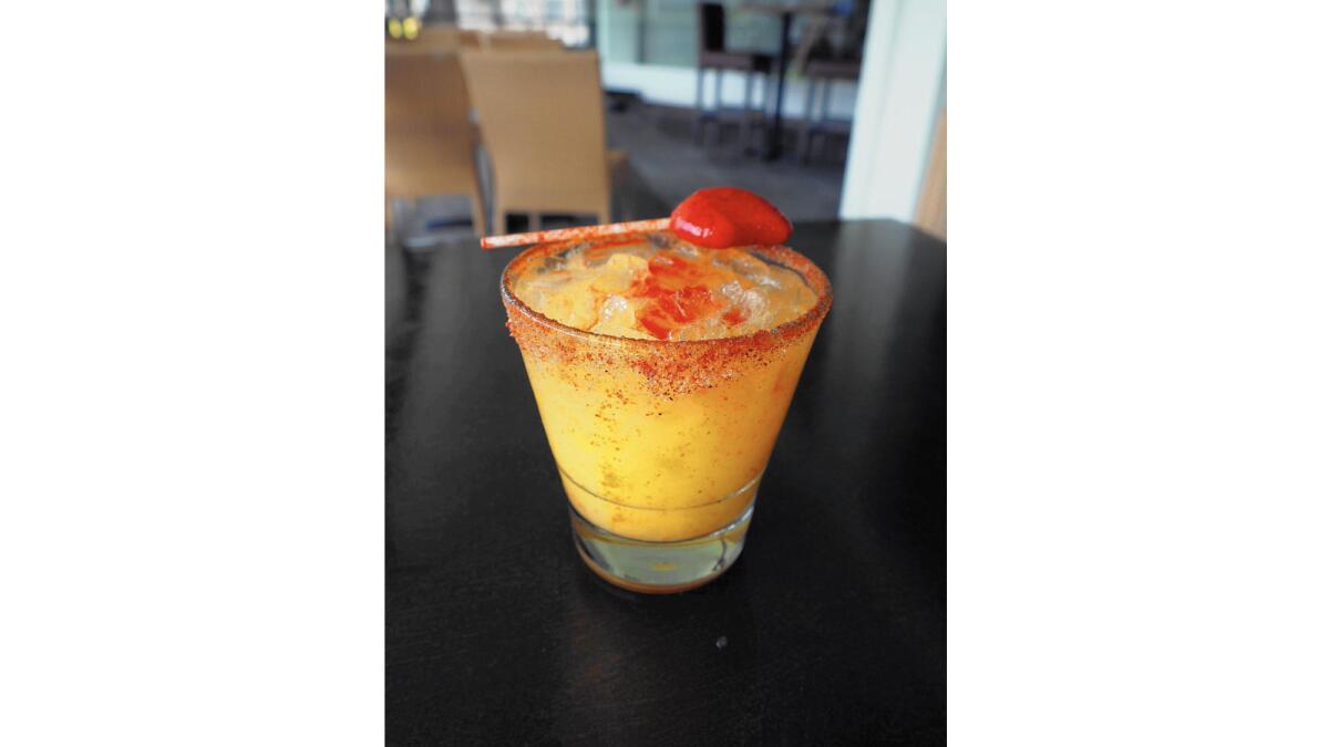The mango con chile cocktail from Playa Amor in Long Beach.