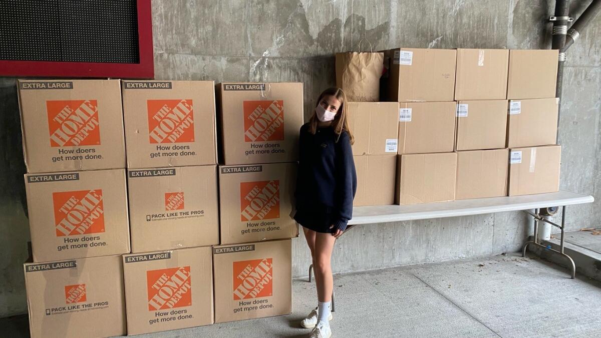 Andrea Rix with period product donations delivered to the San Diego Convention Center.