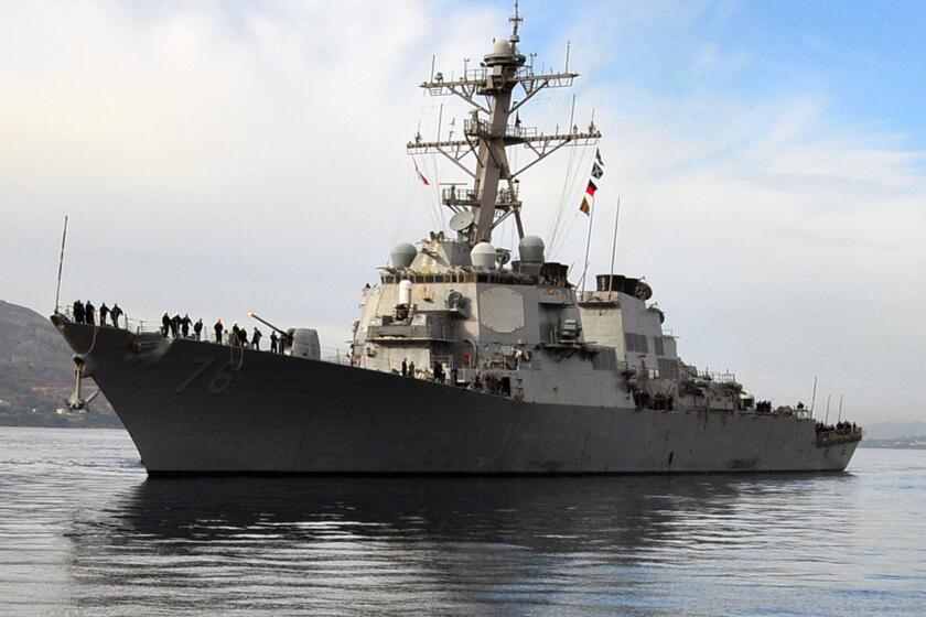 The guided missile destroyer USS Higgins (DDG 76) arrives for a port visit in Souda Bay, Crete, Greece.