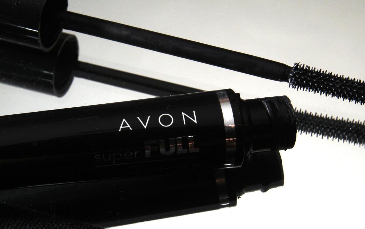 Avon said Thursday it has reached a tentative agreement with federal regulators that involves paying $135 million to settle bribery charges.