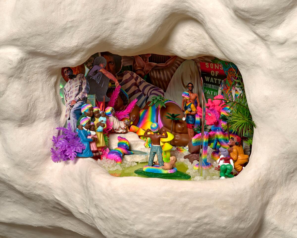 The interior of a cement art installation showing toys, trinkets and magazine clippings