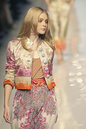 The Moroccan look, notable at Etro's spring/summer collection, involves the sort of mixing and matching seen here in a combination of metallic brocade and bright colors.
