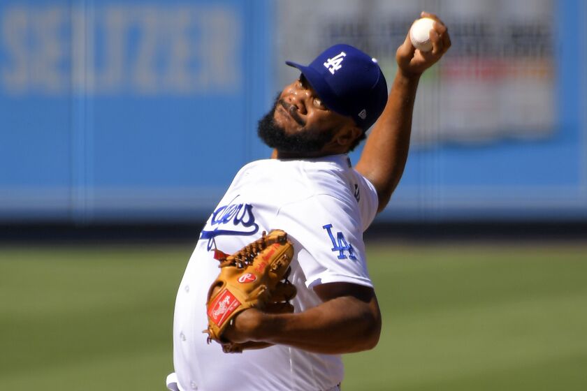 Los Angeles Dodgers relief pitcher Kenley Jansen throws to the plate during the ninth inning.