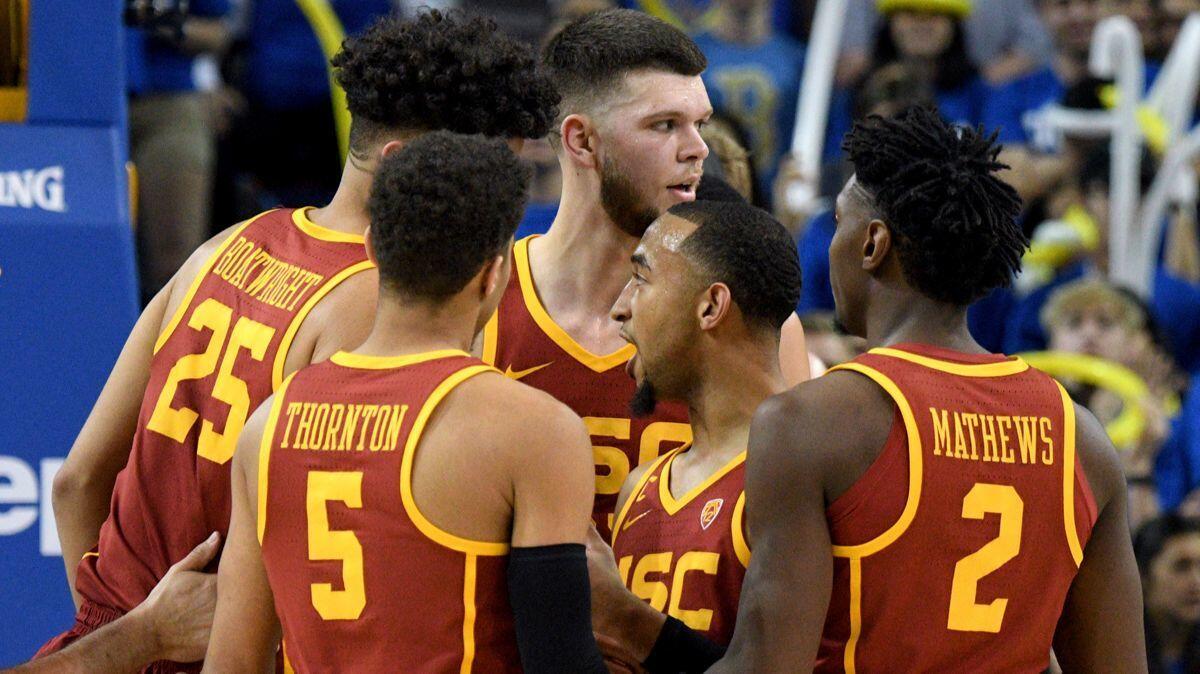 USC players huddle during a game against UCLA on Feb. 3.