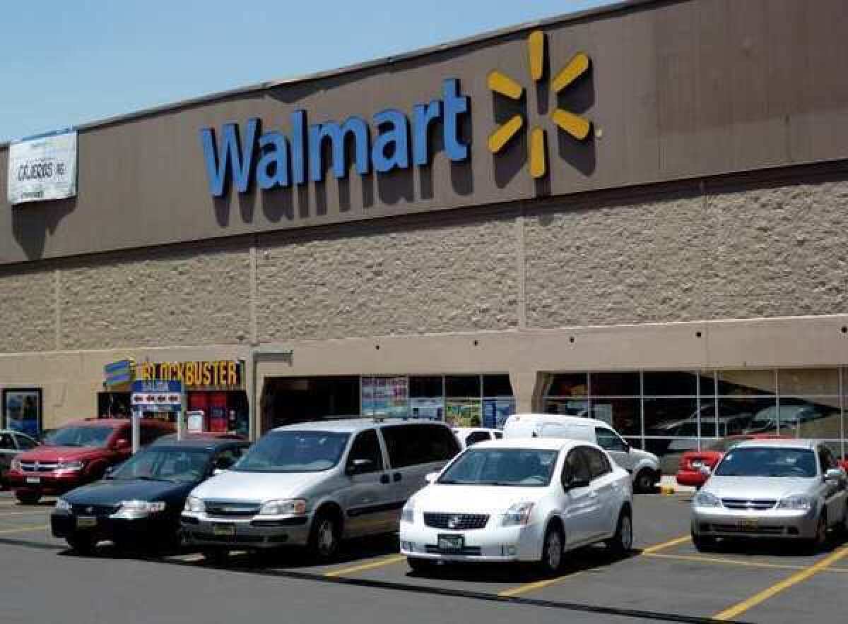 Wal-Mart said it would hire more than 50,000 seasonal workers for the holidays