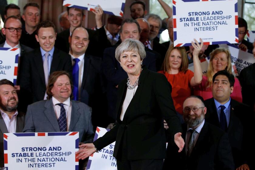 Britain's Prime Minister Theresa May (C) delivers a speech to Conservative Party members as they launch their election campaign in Walmsley Parish Hall in Bolton in north-western Greater Manchester on April 19, 2017. / AFP PHOTO / POOL / ANDREW YATESANDREW YATES/AFP/Getty Images ** OUTS - ELSENT, FPG, CM - OUTS * NM, PH, VA if sourced by CT, LA or MoD **