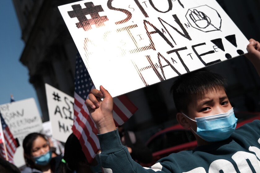 People participate in a protest to demand an end to anti-Asian violence on April 04, 2021 in New York City. 