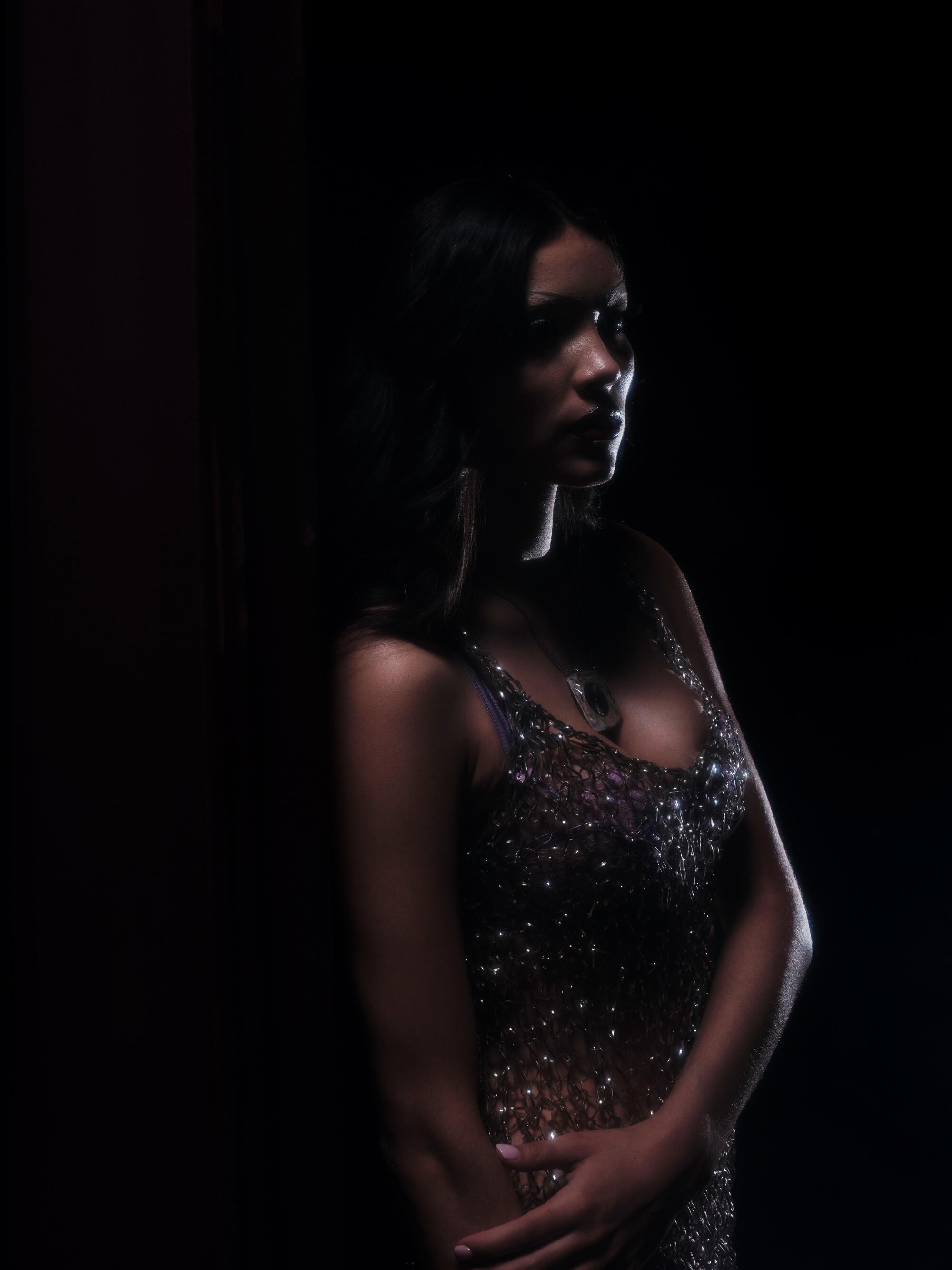 Noelle wears vintage plastic knit dress, Agent Provocateur lingerie, custom-made jewelry by Chloé Maratta.