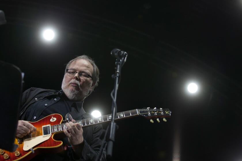 INDIO, CALIF. -- FRIDAY, APRIL 10, 2015: Steely Dan's Walter Becker on stage at the Coachella Valley Music and Arts Festival Indio, Calif., on April 10, 2015. (Brian van der Brug / Los Angeles Times)