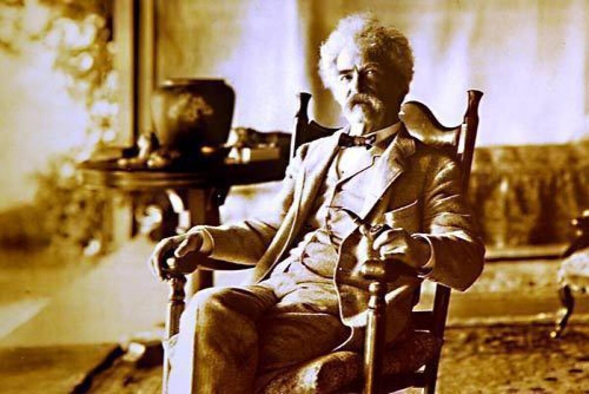 Mark Twain, in his later years. The photo is part of a display at the Mark Twain Boyhood Home & Museum in Hannibal, Mo.