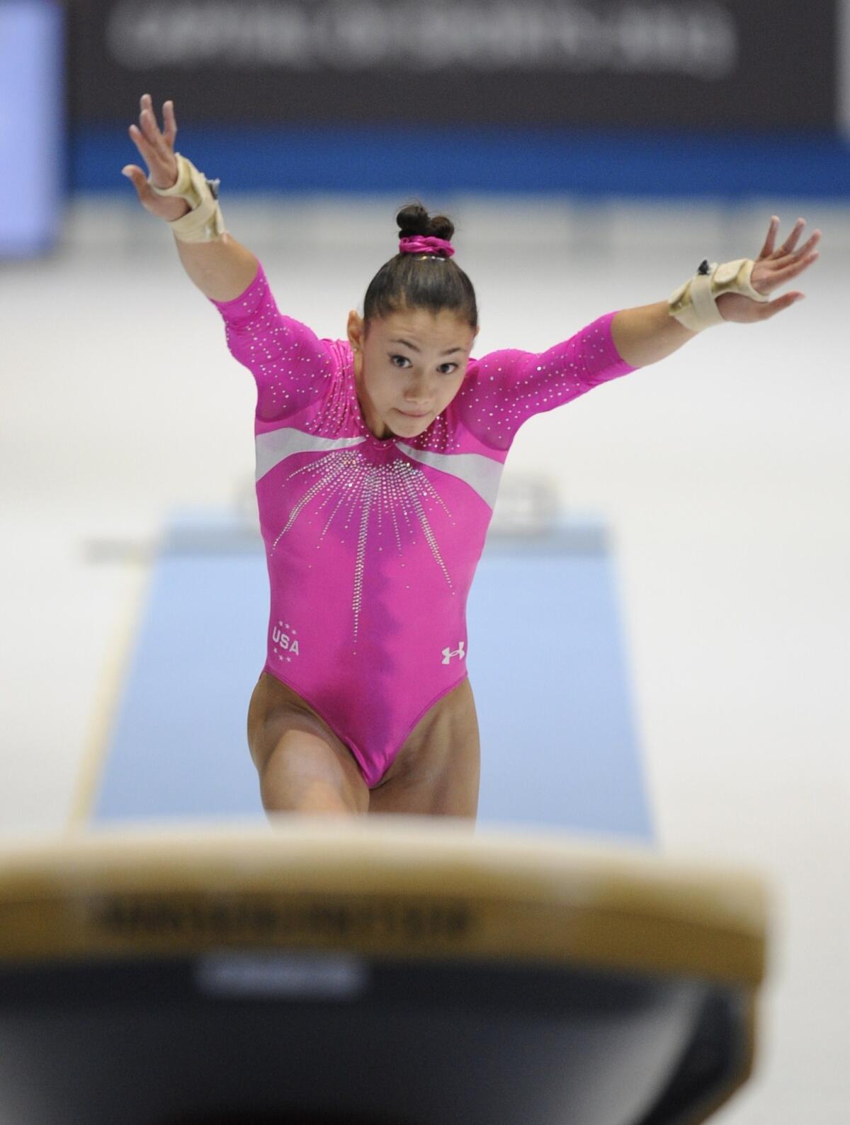 Kyla Ross competes on the vault during her performance in the all-around final at the 2013 world championships Friday.