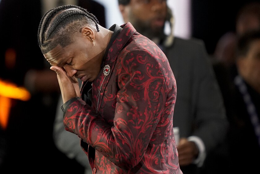 Bennedict Mathurin reacts after being selected sixth overall by the Indiana Pacers in the NBA basketball draft, Thursday, June 23, 2022, in New York. (AP Photo/John Minchillo)