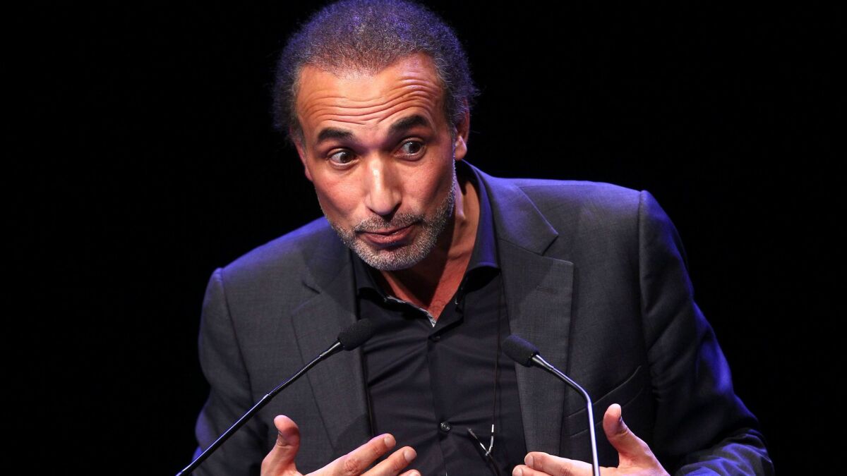 Muslim scholar Tariq Ramadan delivers a speech during a French Muslim organizations' meeting on Feb. 7, 2016, in Lille, northern France.
