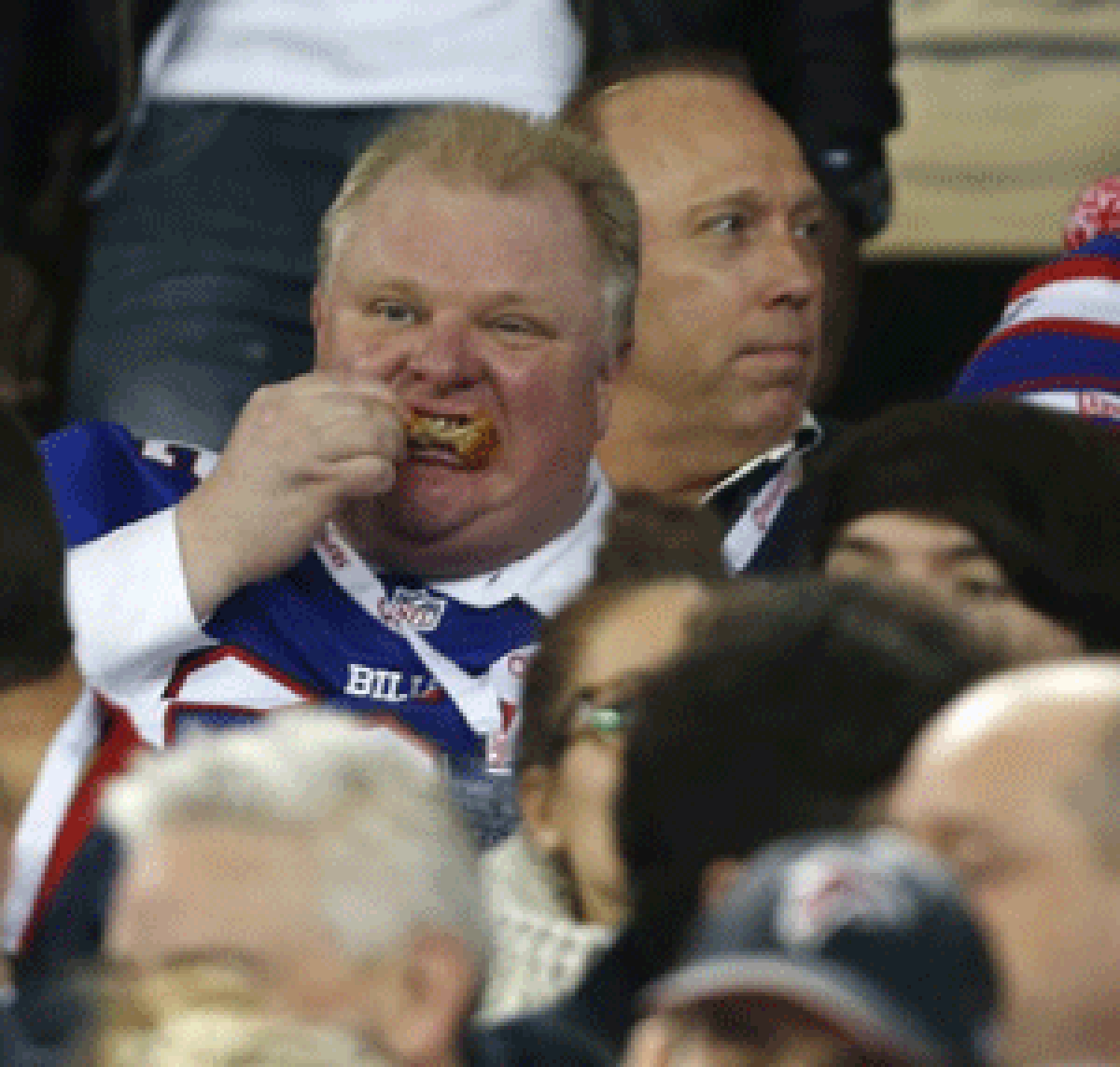 Rob Ford enjoys Sunday's Buffalo Bills game and some tasty wings.
