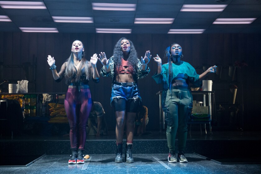 Cheyenne Isabel Wells, from left, Brittany Campbell and Tickwanya Jones Pasadena Playhouse play the chorus in “Little Shop of Horrors” at Pasadena Playhouse.