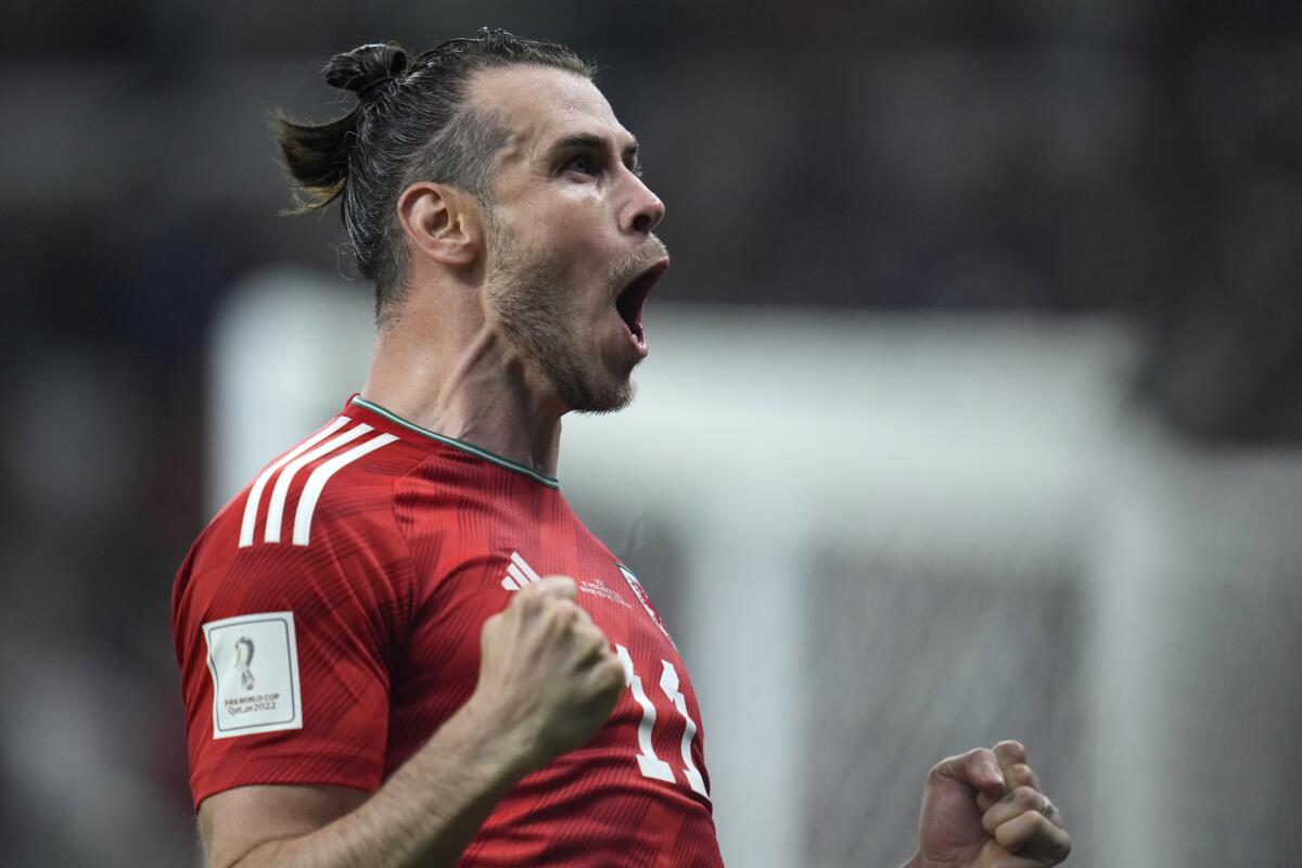 Gareth Bale celebrates after scoring a game-tying goal on a penalty kick against the U.S.