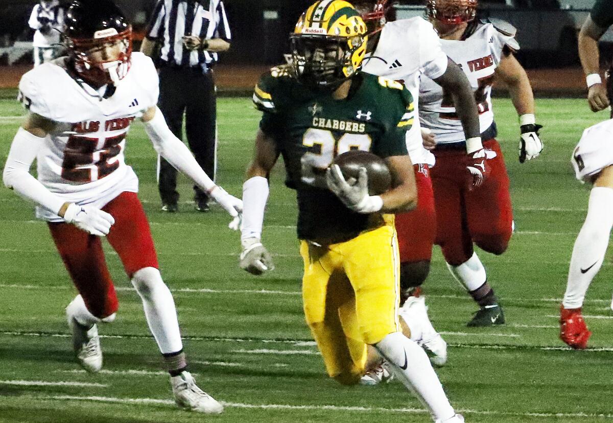 Edison's Maddox Thomas (20) finds an opening against Palos Verdes in a nonleague game on Friday.