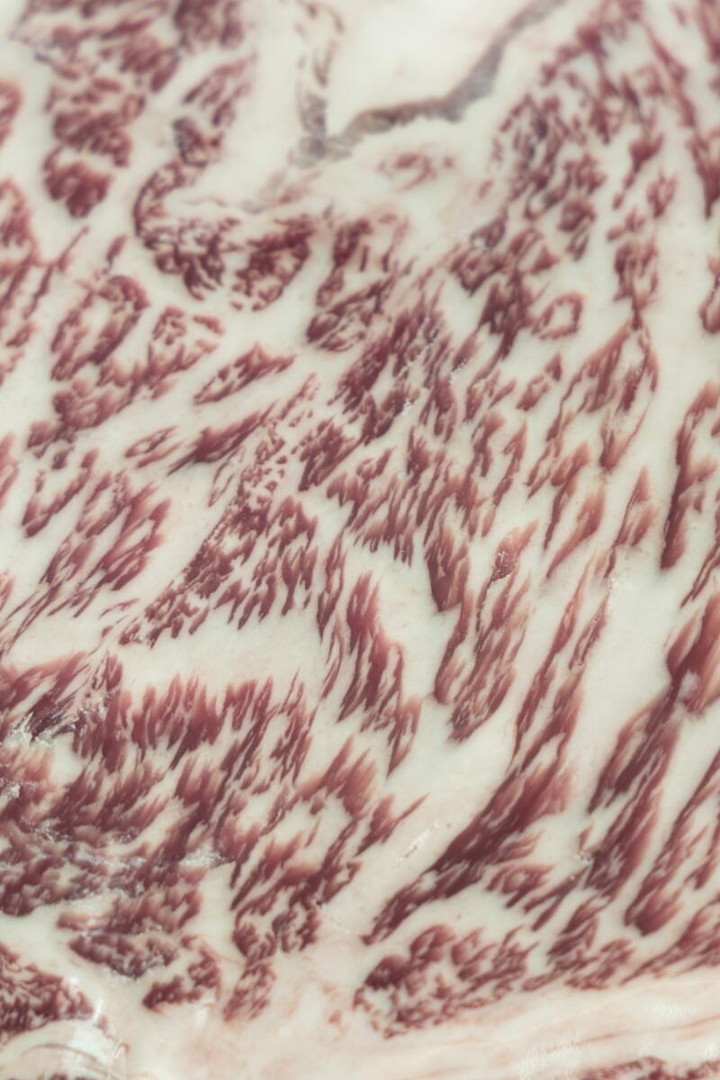 Wayyan, the left, and the chip roll in the Svan meat market.